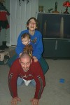Sheila, Faren and Butch getting Horsey ride on Jason