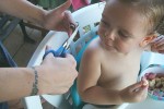 MOM DOES THE FIRST CUT.JPG