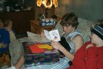 Mikey reading a birthday card