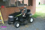 SITTING ON MOWER