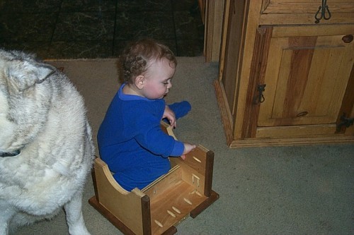 Faren in his make believe car (14 months