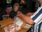 Dad and grandma doing a little pre-Thanksgiving packaging of the "bulk bacon!"
