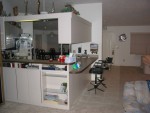 I had the tile put in front of the kitchen counter area and it makes for a nice place for the stools.  My buddy Mike did a heck of a job on the tile!