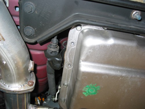 Bracket bolts removed and bracket moved up and out of the way.