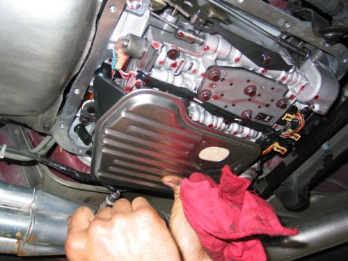 Install your new filter.  The filter can be installed crooked so make sure you have it straight and aligned in parallel with the sides of the transmission.