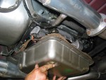 Place the gasket on top of the pan and grab a handful of the tranny bolts.