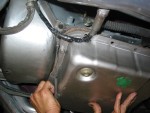 Align the pan and gasket and install a couple of bolts finger tight.