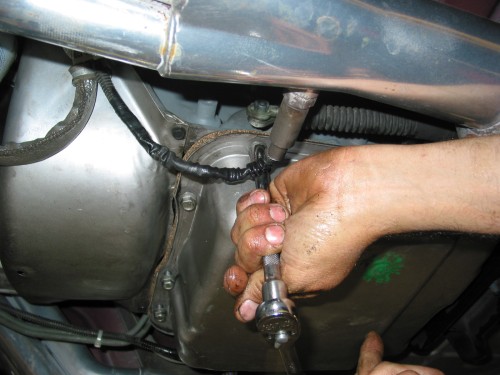 Install all the bolts in the tranny and just snug them up.  Don't tighten them at this point... yet!