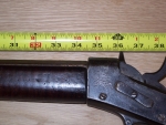 The Barrel is 34.5" long and screws in.